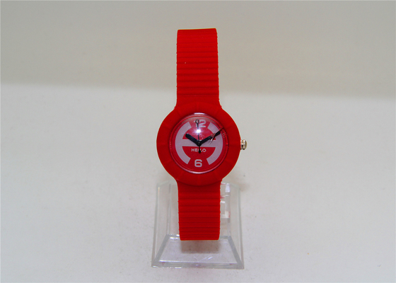 Os relógios análogos das meninas plásticas vermelhas da forma redonda caçoam relógios do silicone
